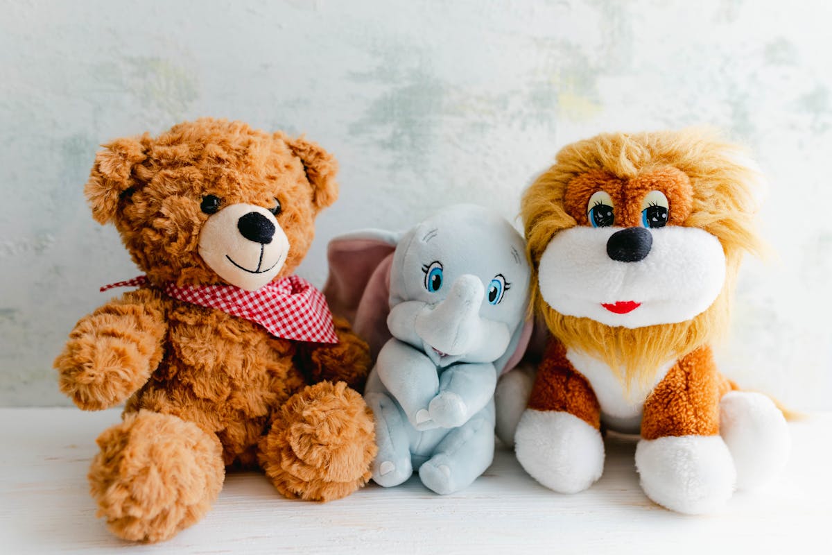 Colorful collection of plush stuffed animal toys on display