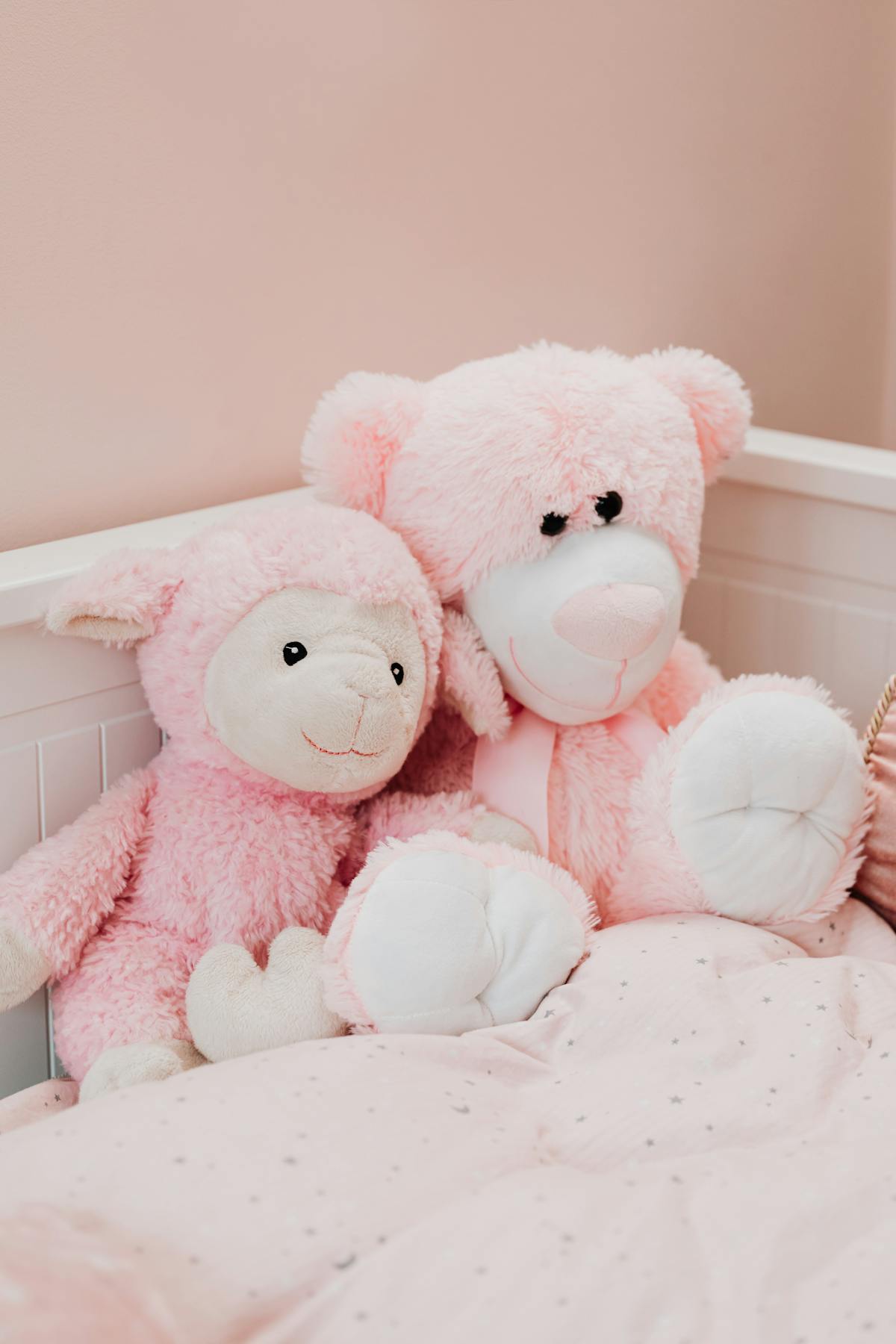 Child hugging a large stuffed plush animal toy